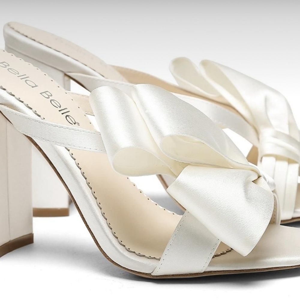 Izzy Ivory high Block Heel Mules with Asymmetric Bows from Bella Belle